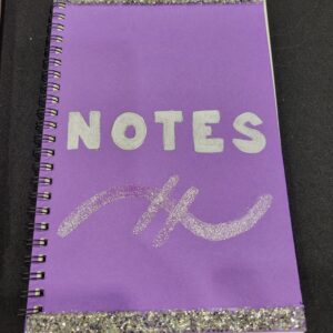 Purple Notebook with Notes