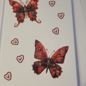 White Notebook with Red Butterflies (no lines)