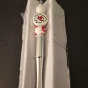 Red and white beaded Chiefs Pen