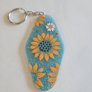 Blue Acrylic Motel Keychain with Sunflower