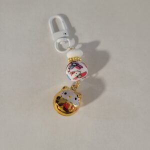 Small HK Gold Bell and White Keychain